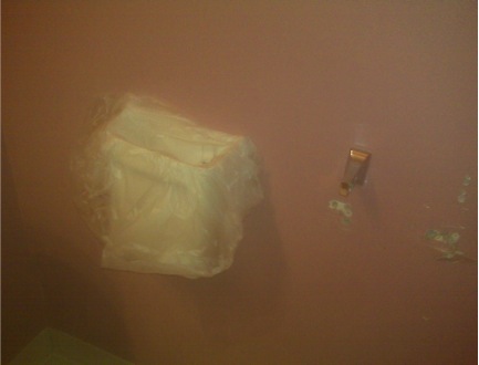 Broken toilet paper holder